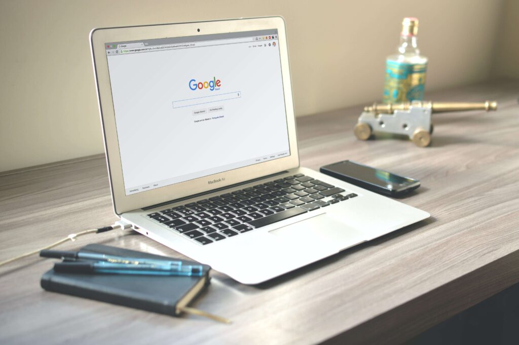 computer on desk researching online visibility